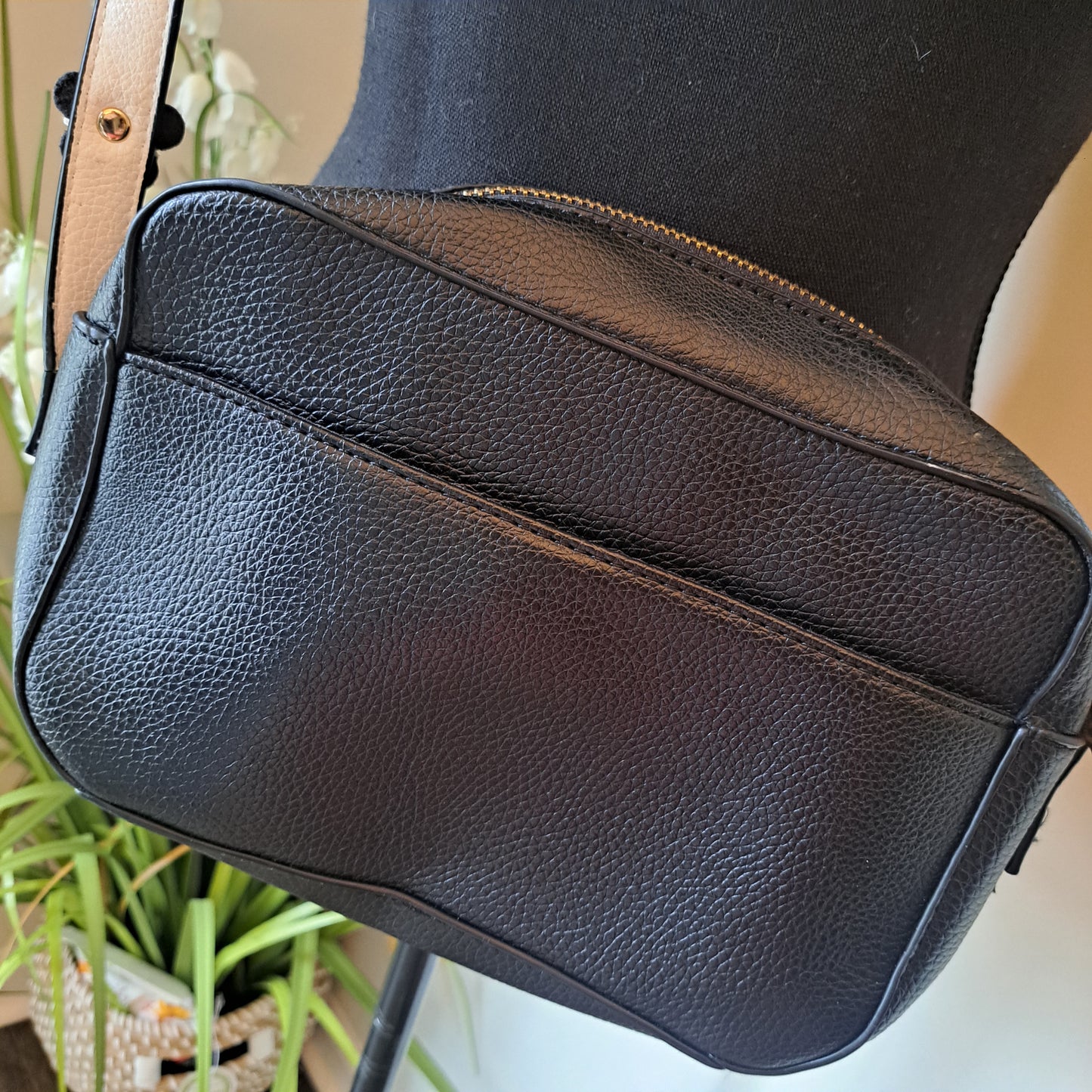 IMO Black faux leather crossbody with flowers on shoulder strap